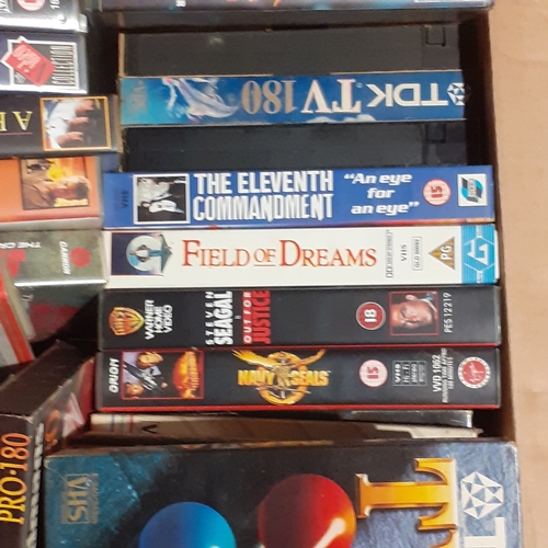 20 - A number of VCR cassettes including popular vintage films and some blank tapes