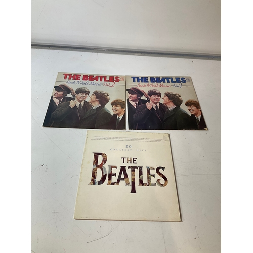 130 - 3 Beatles LPs. Rock and roll volumes 1 and 2 and 20 greatest hits.
