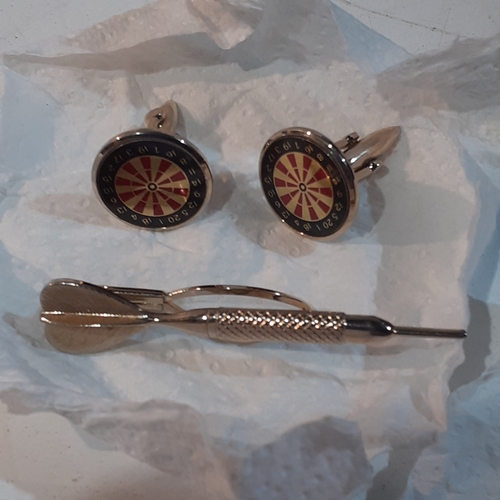 2 - A large number of cufflinks, some with matching tie pins. A pair of dartboard design with a dart tie... 