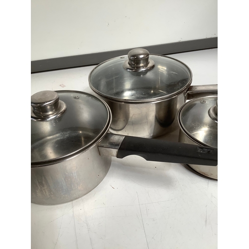 291 - Set of three saucepans