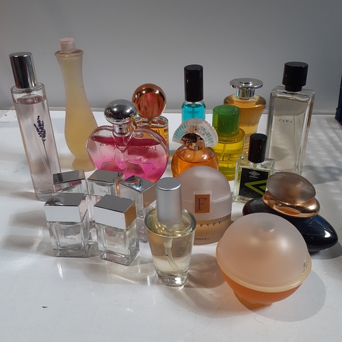 37 - 20 bottles of various perfumes and sprays. Mostly look unused. One or two, small amount missing
