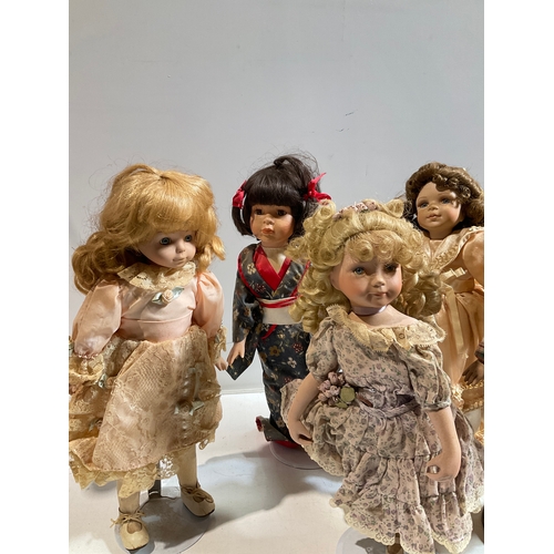 30 - Quantity of porcelain dolls. No damage, but dusty and would benefit from a clean.