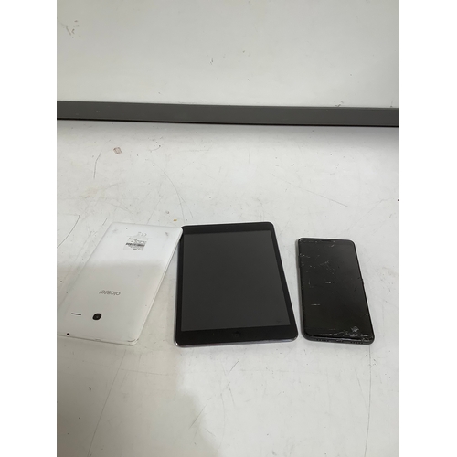 377 - I pad mini alcatel tablet alcatel phone sold as spares