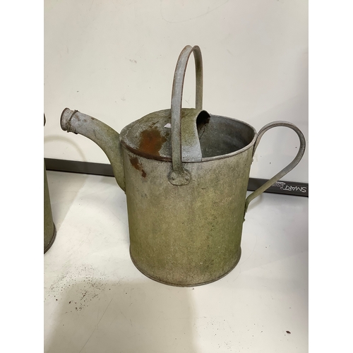 390 - 2 Galvanised watering cans