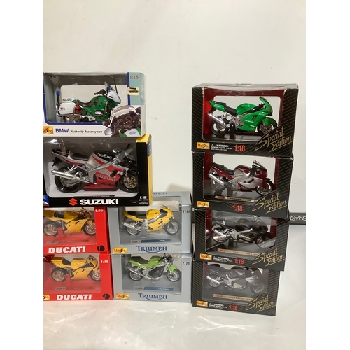 398 - Collection of 1-18 scale motorcycle models including triumph Yamaha Ducati Suzuki BMW