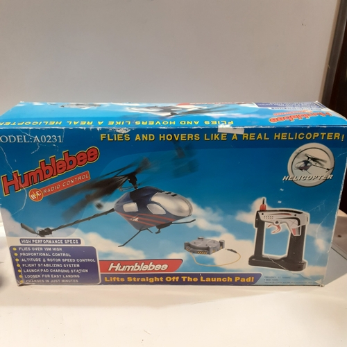 26 - Humblebee model remote control helicopter. Model A0231. Good condition but untested due to lack of b... 