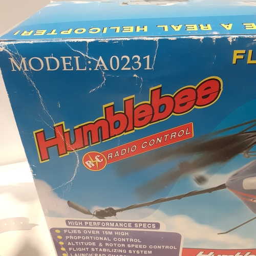 26 - Humblebee model remote control helicopter. Model A0231. Good condition but untested due to lack of b... 