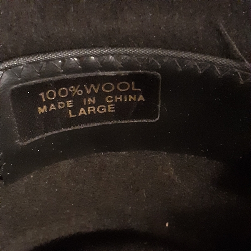 18 - Cowboy hat 100% wool. Has braided trim.  Size large. Good condition but could do with a brush as bit... 