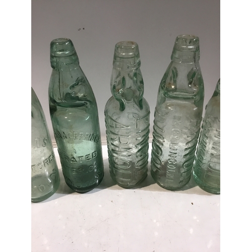 28 - A collection of codd bottles with marbles