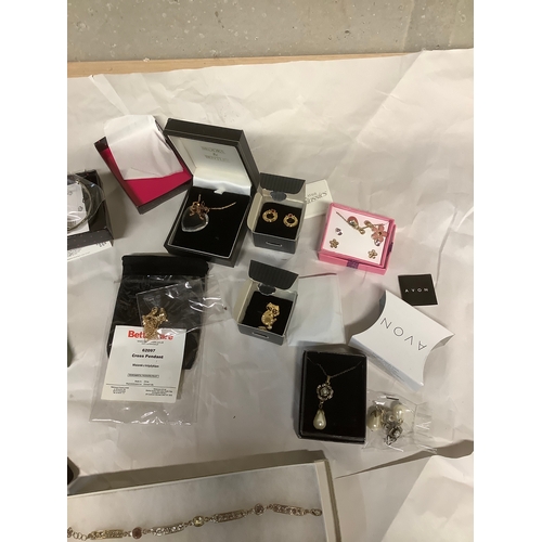 95A - Large lot of new Avon and other costume jewellery