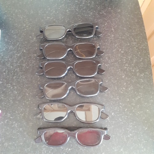 12 - 6 pairs of Real D 3D cinema glasses.