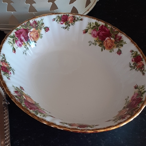 11 - A selection of dishes and trays. Includes Royal Albert Old Country Rose's, copper, vintage and glass... 