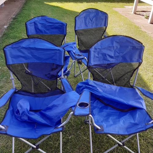25 - 4 canvas camping fold up chairs. Each has cup holder in arm. Each with carry cover. Some slight wear... 