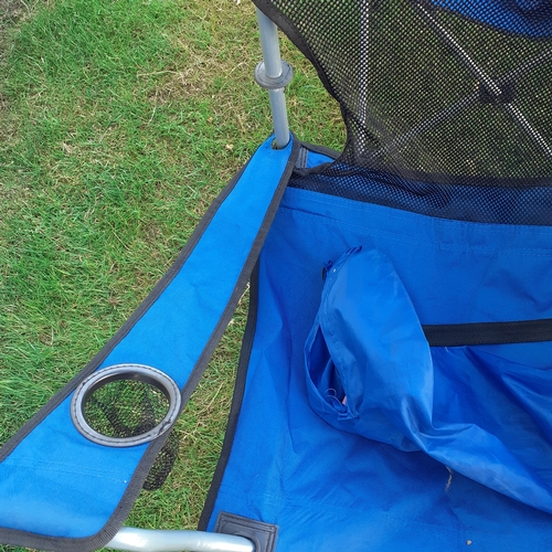 25 - 4 canvas camping fold up chairs. Each has cup holder in arm. Each with carry cover. Some slight wear... 