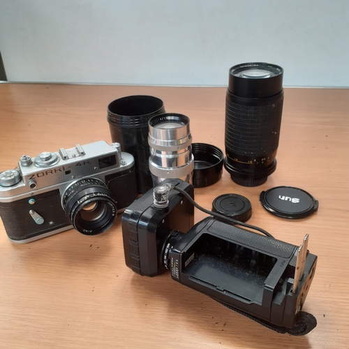 31 - Camera lot. Russian Zorki-4K plus a Russian lens number 7702922. Also includes a Macro Sun zoom numb... 
