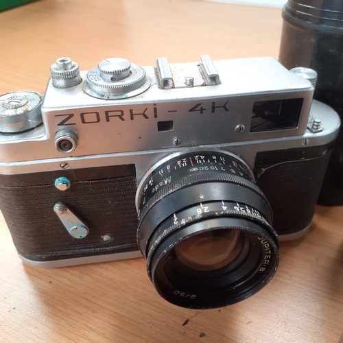 31 - Camera lot. Russian Zorki-4K plus a Russian lens number 7702922. Also includes a Macro Sun zoom numb... 