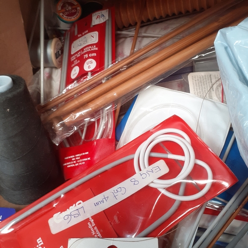 28 - Sewing/knitting lot. Knitting needles, lots of cotton reels, other vintage knitting items and more