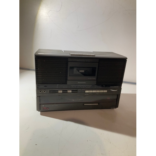 94 - Panasonic stereo music system. Model SG – J555L. Tested and working.