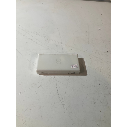 136 - Nintendo DS lite. White in colour. Working, no leads