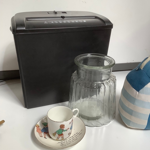 276 - Mixed lot paper shredder, glass vase, a house doorstop plus Georgie Porgy pudding and pie cup and sa... 