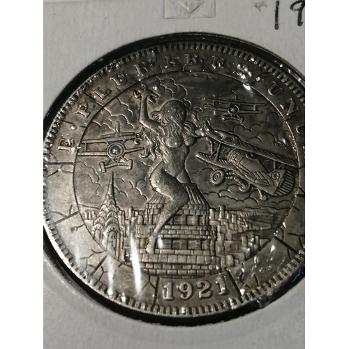 33A - USA 1921 silver dollar with artwork on the obverse