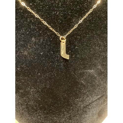 79 - 9ct Gold necklace with gold J pendant