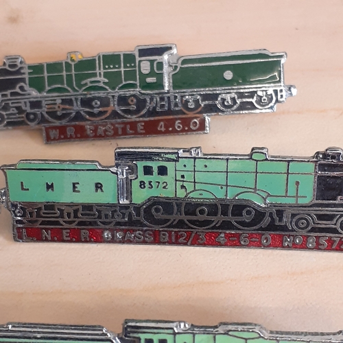 73A - A collection of 6 train related badges. Included is class JIS O-6-O EX G E.R, W.R CASTLE 4.6.0, E.R ... 
