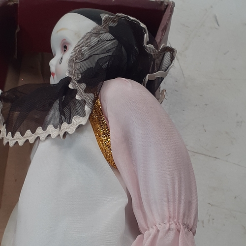 14 - Porzellan Puppe porcelain Pierrot doll. In original box. No damage albeit a little dusty.