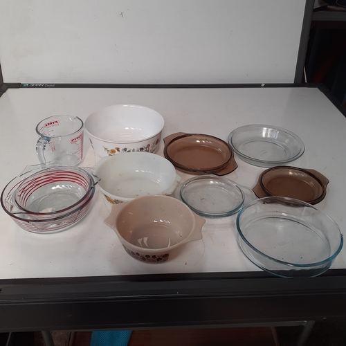 10 - Pyrex lot. Mixed dishes and lids. Some vintage patterns. No damage