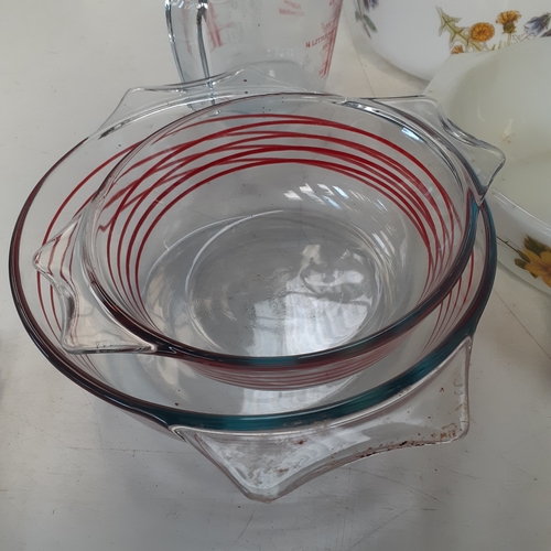 10 - Pyrex lot. Mixed dishes and lids. Some vintage patterns. No damage