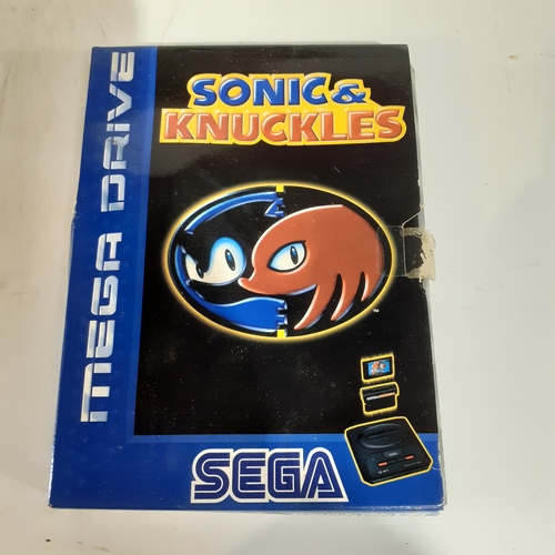 34 - Megadrive game.  Sonic and knuckles.  Game is like new condition. Box has wear