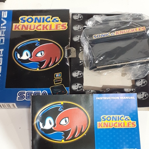 34 - Megadrive game.  Sonic and knuckles.  Game is like new condition. Box has wear