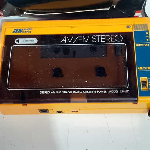 40 - Audio lot to include an AS audio sonic personal cassette player, a Phillips NT-3002/05S portable all... 