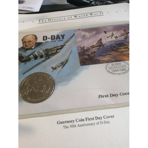 23A - COINS : History of WWII folder with a number of first day cover sets