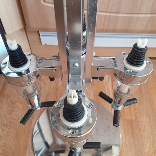 40 - Bar standing optics dispenser. Holds 4 bottles. All springs working and all intact. No damage but wo... 