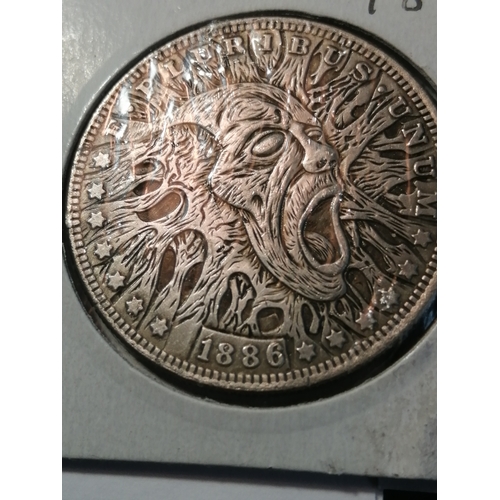 32A - USA silver dollar with skull design on obverse