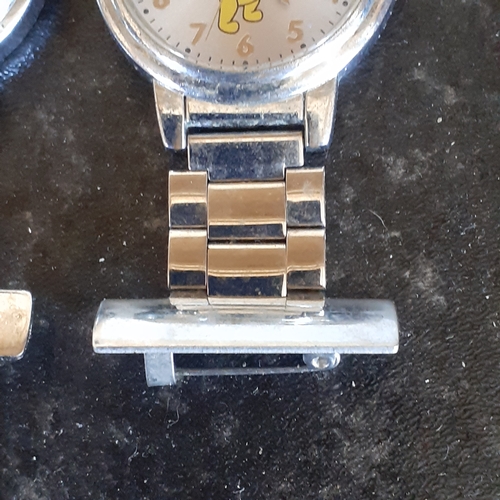 94 - 2 nurses style fob watches. A Quartz Constant and a Winnie the Pooh. Good condition but require batt... 