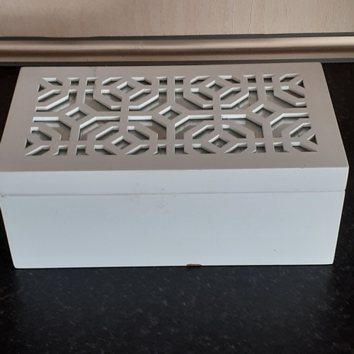 23 - White wooden jewellery box containing a quantity of rings. Varying colours and stones. Some very eye... 