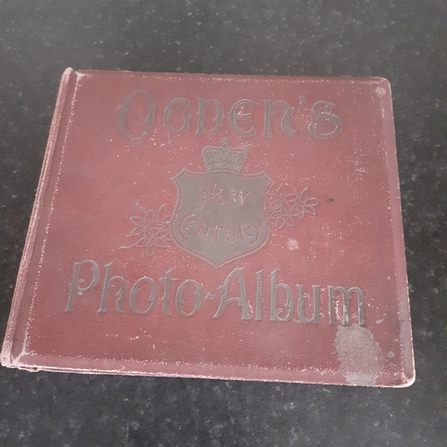 25 - Antique Ogdens photo album containing more than 50 Ogdens Guinea Gold cigarette cards. Some slight w... 