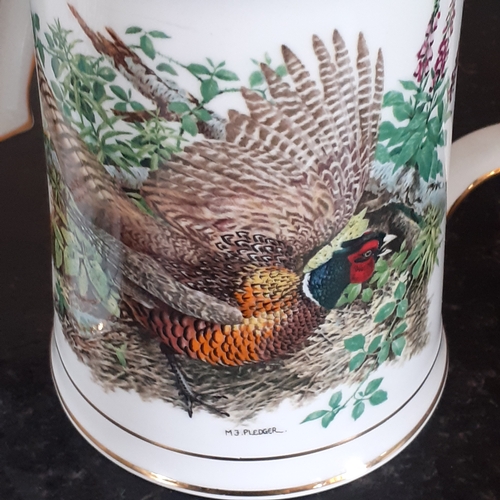 15 - Pair of bone china tankards. Hammersley, Danbury mint from the Game bird collection. Reeves pheasant... 