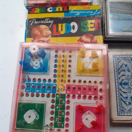 16 - Games lot including pocket Ludo, pocket Chess and Checkers, vintage cards and domino sets