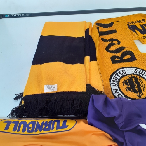 17 - Boston United football lot. Includes shirts and scarves. Sponsored by Tunball on the rear and Kia, D... 