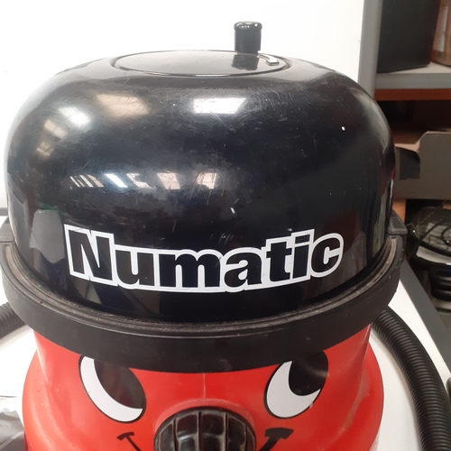 33 - Henry numatic vacuum cleaner.  Has a variety of tools and works well.