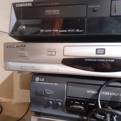 35 - Large lot of mixed audio/visual, including leading brands. All as untested. Vhs players, DVD, brand ... 