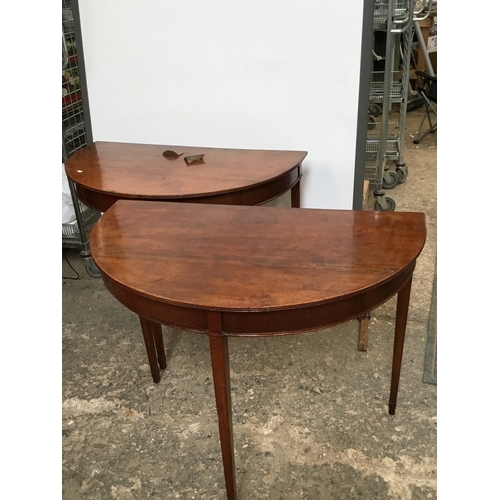 381 - Vintage mahogany duo of demi-lune tables - can also be joint together with 2x brass brackets to make... 