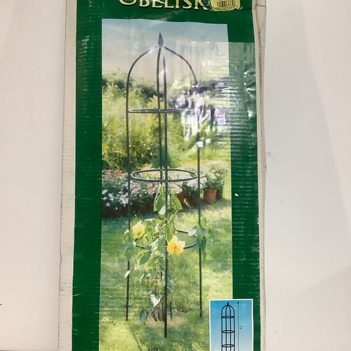 242 - Garden obelisk in box