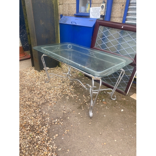 485 - Outdoor glass topped garden table - approx 6ft long