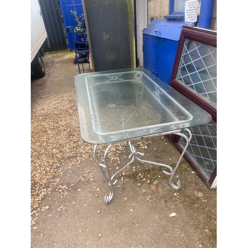 485 - Outdoor glass topped garden table - approx 6ft long