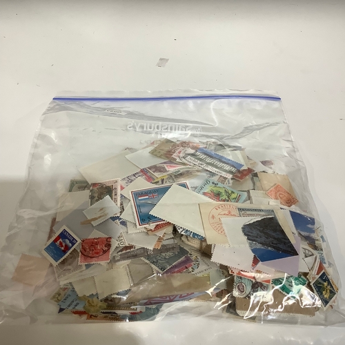 254 - Bag of postage stamps