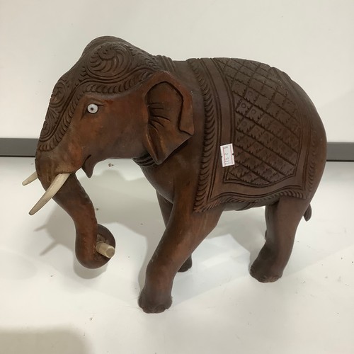 84 - Carved wooden elephant ornament - 30cm tall & wide